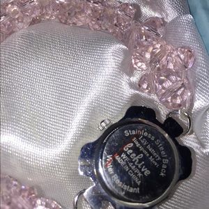 Swarovski Jewelry - Pink Swarovski Crystals With Charm analog watch Swarovski Jewelry - Pink Swarovski Crystals With Charm analog watch
